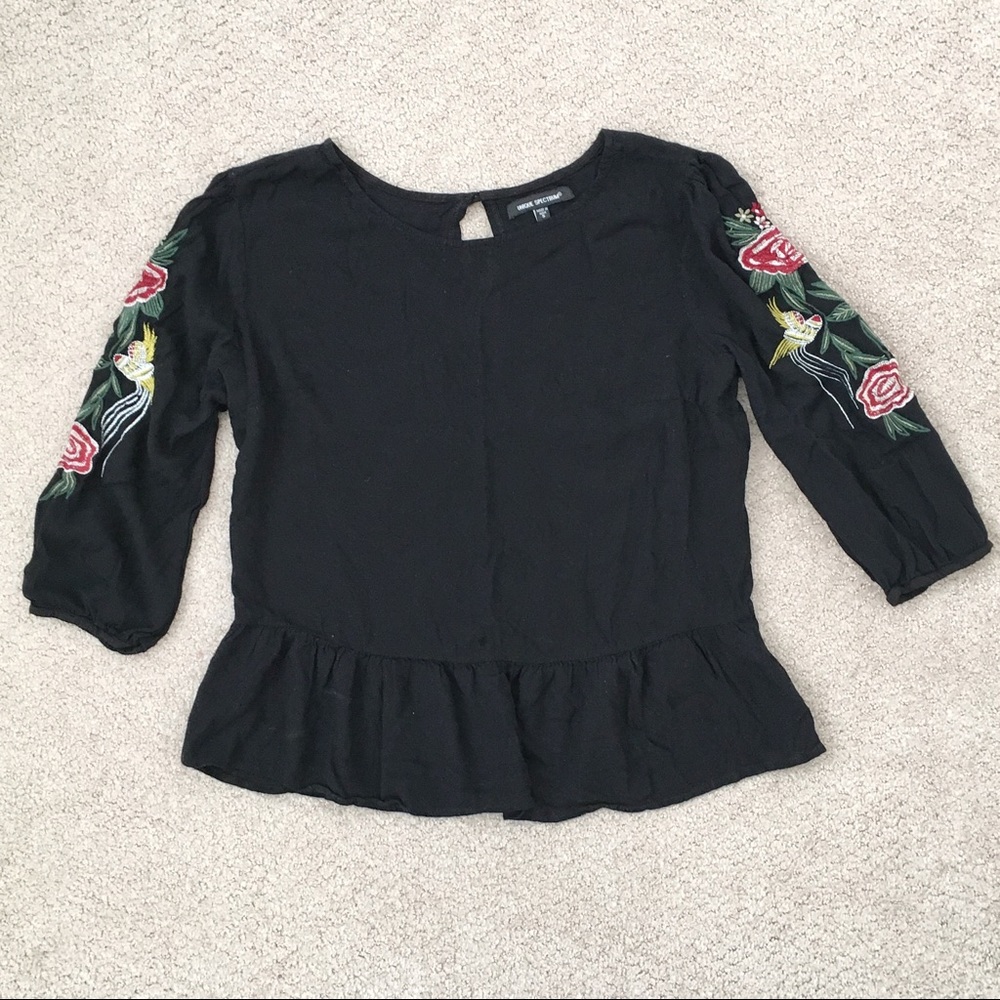 Unique Spectrum peplum embroidered blouse